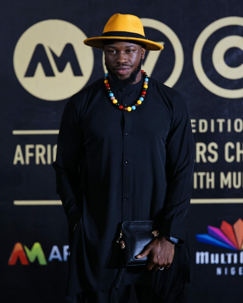 Stan Nze at AMVCA8 Runway Show with Nollywire